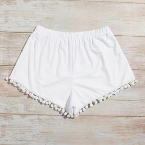 Swim shorts, white, size 6 (US).